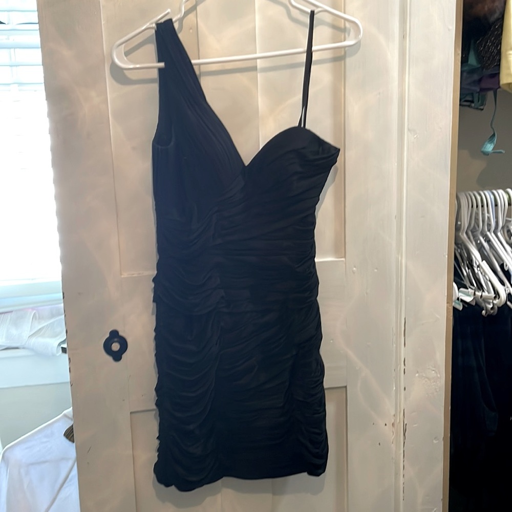 This little black dress is super cute! Only worn once. In perfect condition!